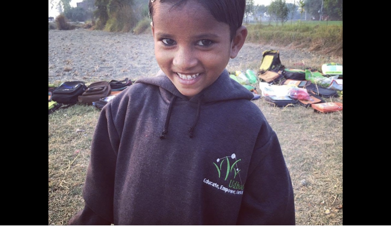 A boy in his Udbodh sweatshirt