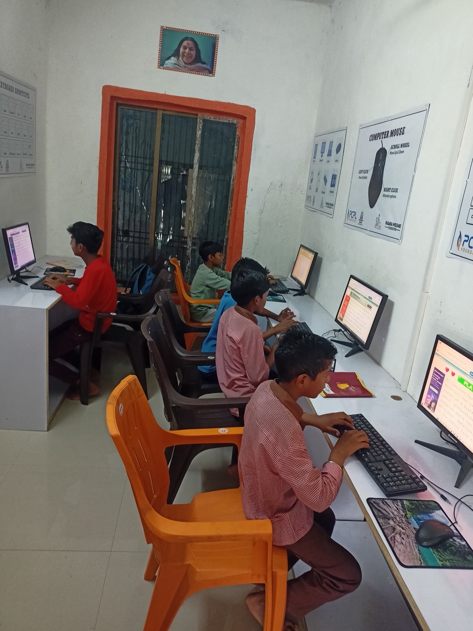 Students at the keyboard, Gajanand Learning Centre